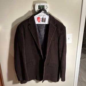 Corduroy brown jacket with designer inside lining.